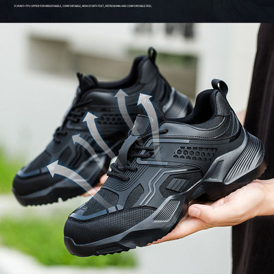 comprar Zapatos de seguridad de logotipo personalizado de color negro duradero con tejido tricotado de TPU transpirable y suela media de kevlar online manufacture